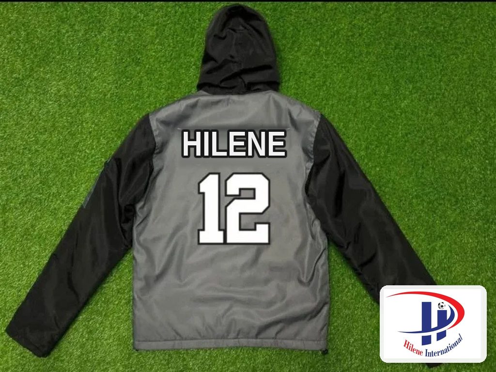 Back of the hooded windbreaker jacket showing a custom printed team name and number 12